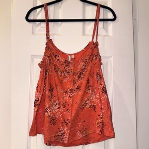 Coral tank with floral details. Adjustable